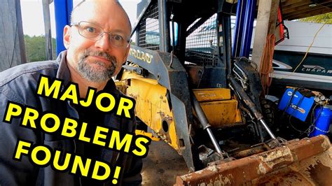 skidsteer lx565 oil change problems